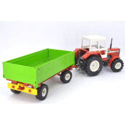 Massey Ferguson MF284S tractor met 2-assig aanhanger