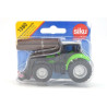 Deutz tractor met voorlader en boomstam