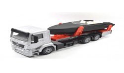 MAN camion avec bateau à moteur