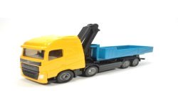 Volvo truck with roll-off tipper and crane