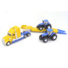 Freightliner met 2 New Holland tractoren