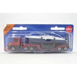 Scania mit Tieflader und Boot